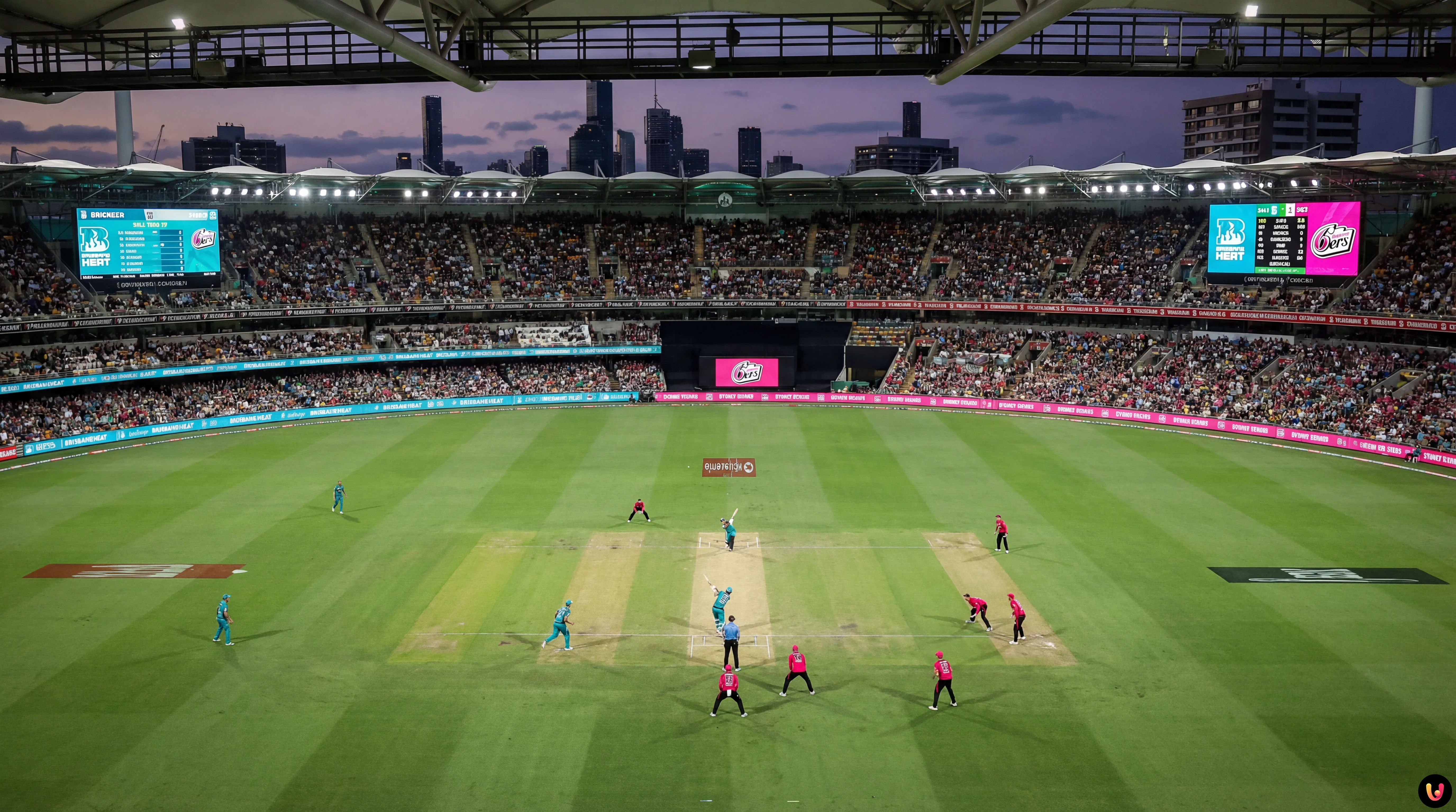 Brisbane Heat cricketers in First Nations kit playing against Sydney Sixers at the Gabba