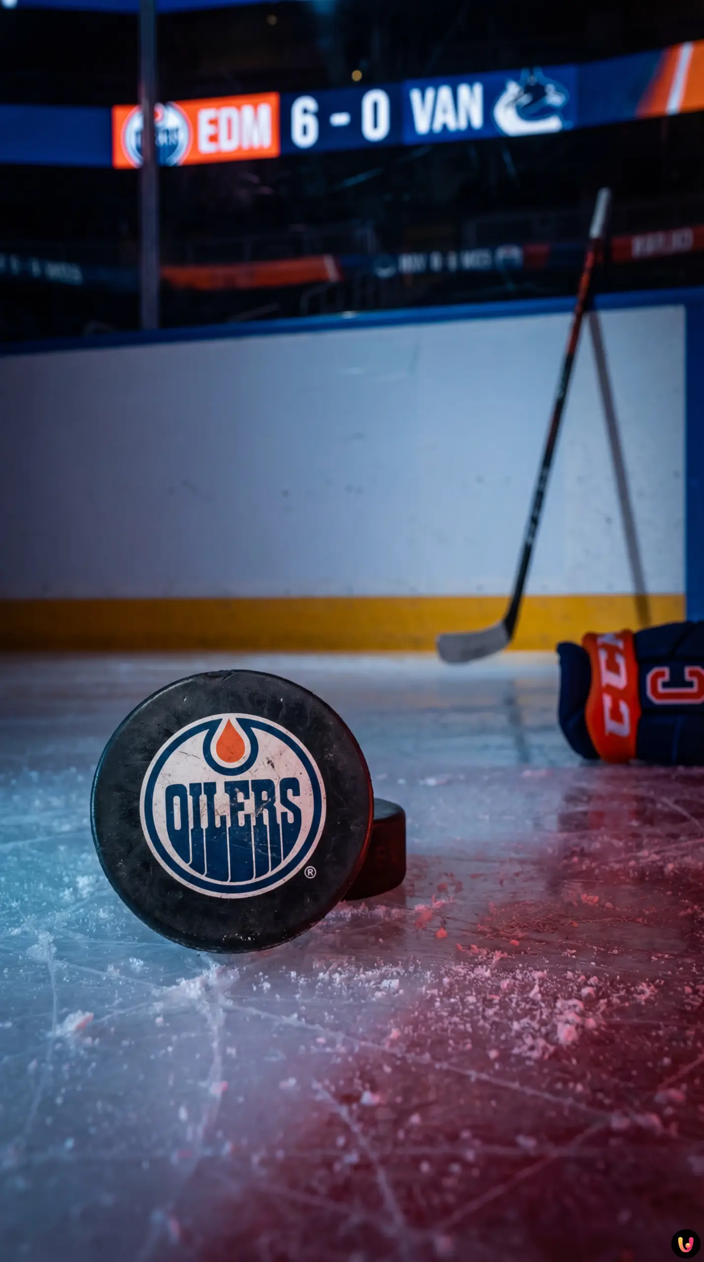 Joueurs des Oilers d'Edmonton célébrant une victoire sur la glace